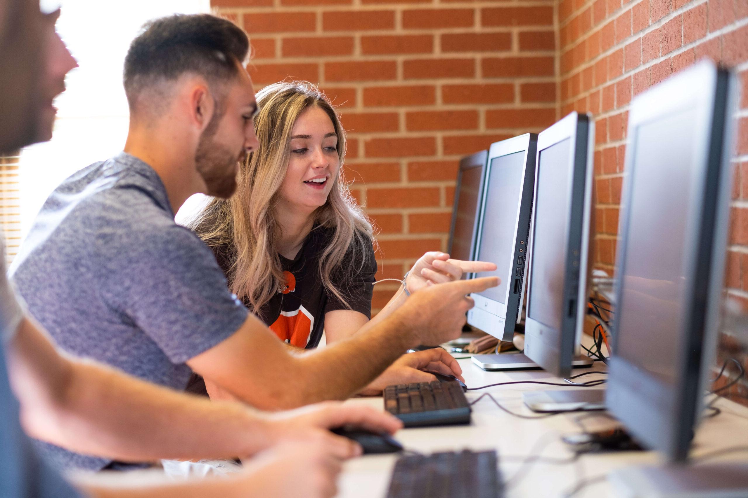 college students at computers in franks hall